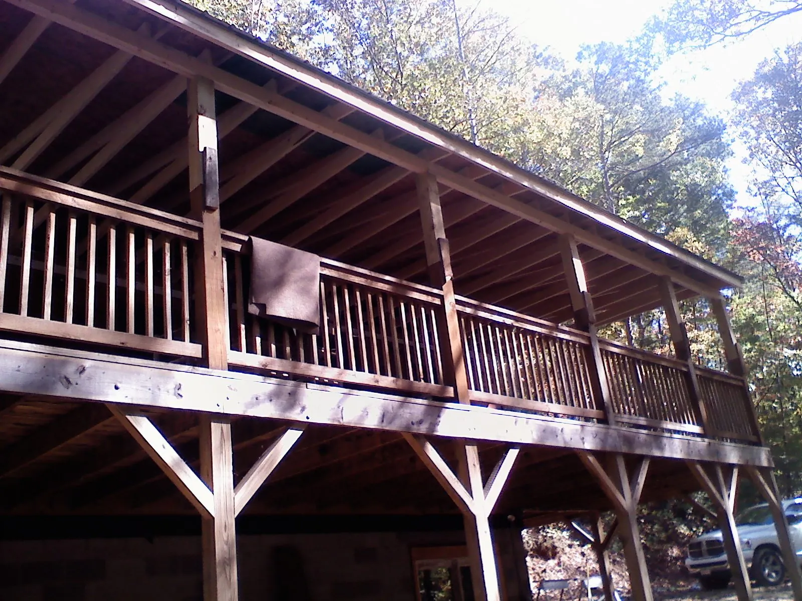 Timber framing under a new elevated porch and deck — Roof Leak Repair in Rices Landing by Roofing Brothers